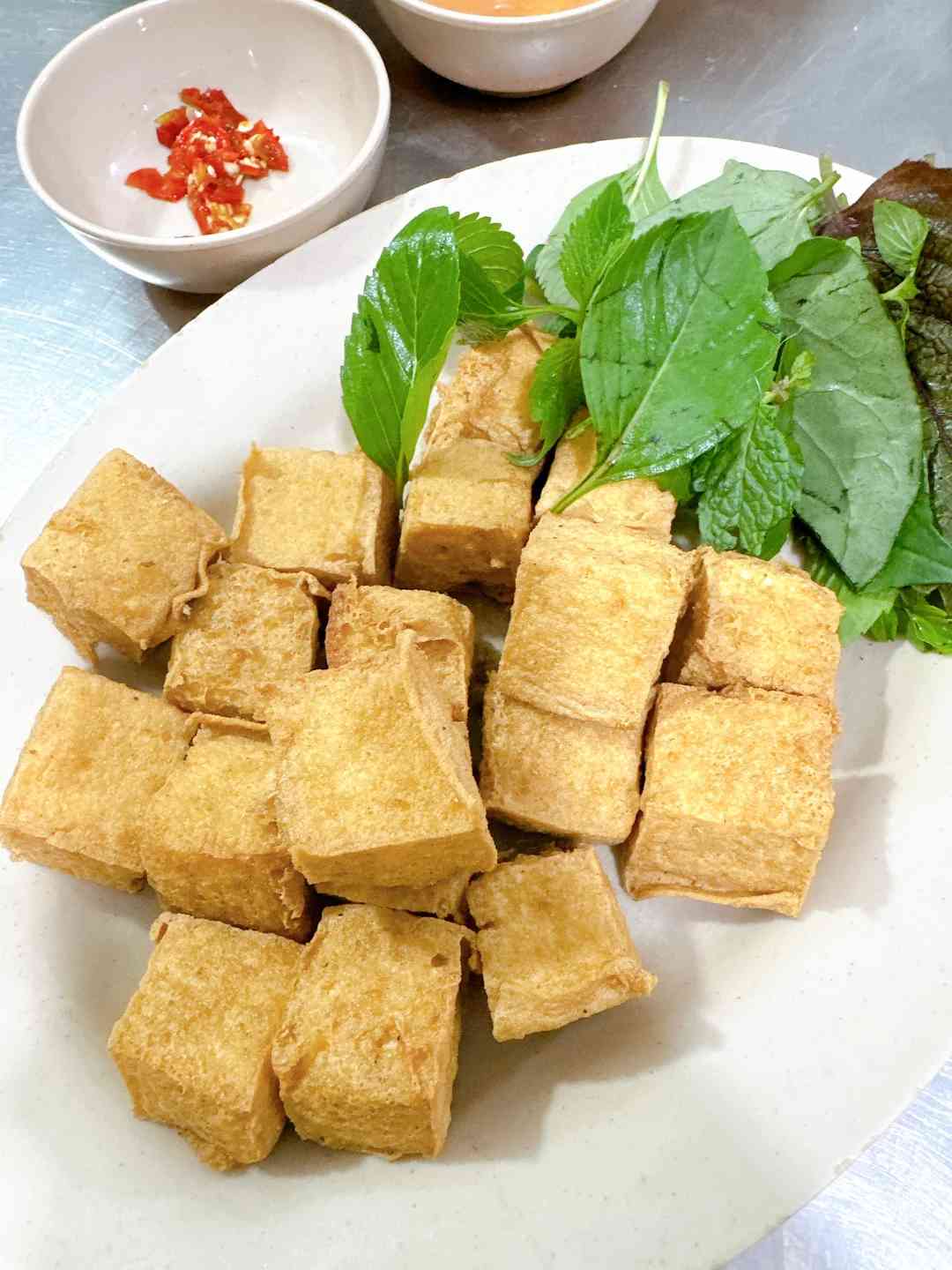 Descubra Lanches Noturnos Acessíveis em Ho Chi Minh City por menos de US$ 30 por Pessoa