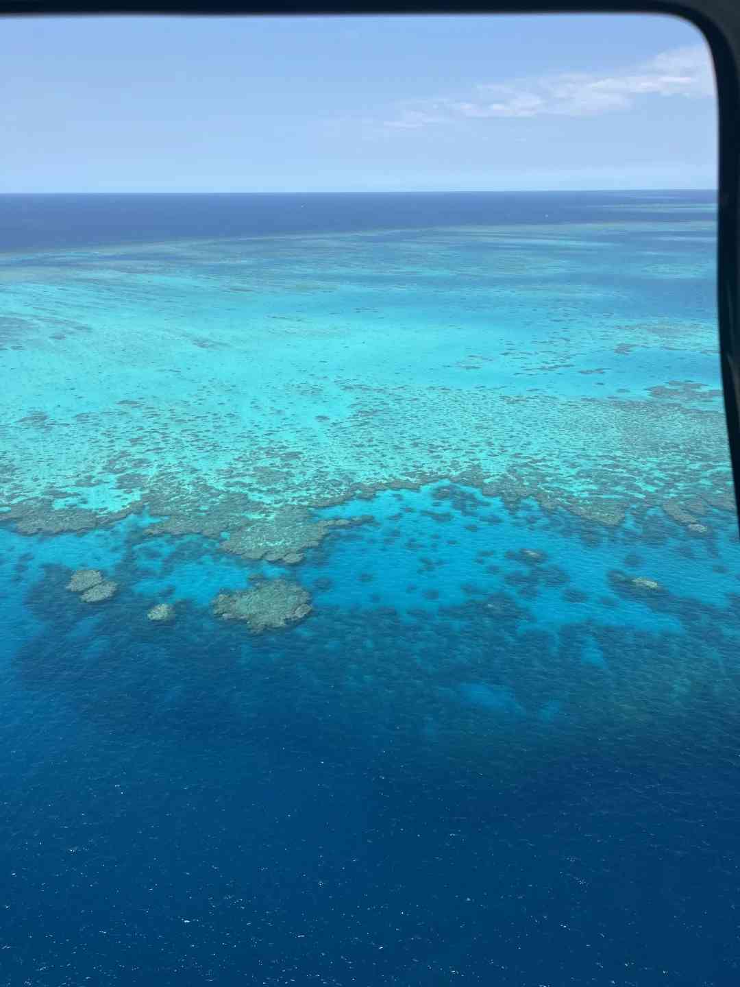Explorer la Grande Barrière de Corail : Tour en Hélicoptère et Aventure de Plongée avec Tuba