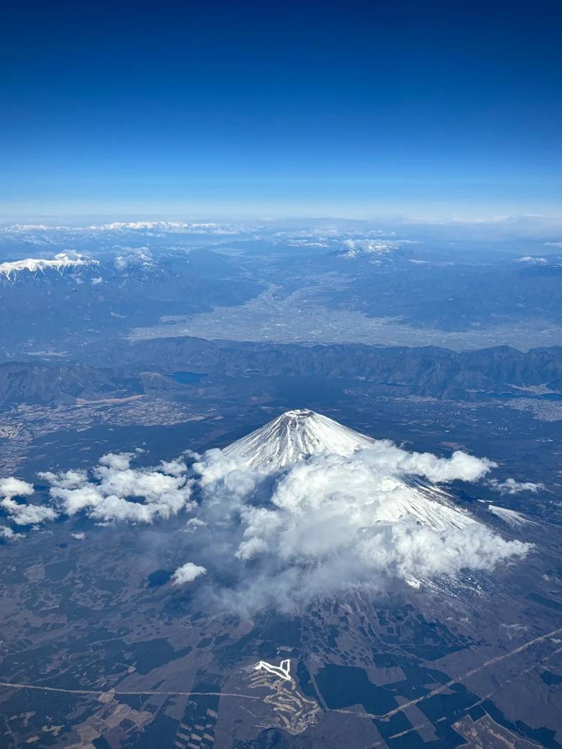 Stunning Aerial View of Mount Fuji from Your Plane Window | Japan Travel Guide