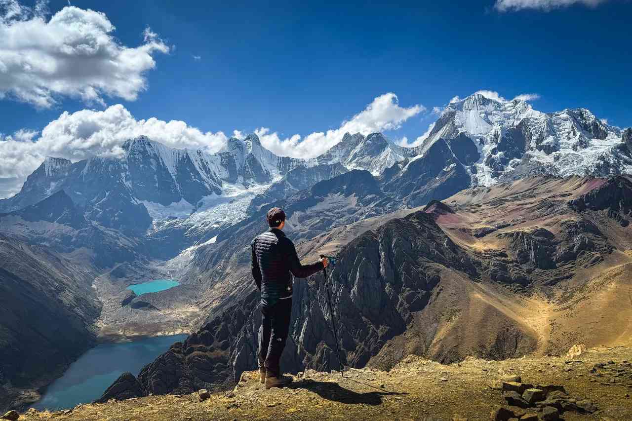Embrace Solitude: Choosing to Turn My Back on the Crowd Near Snow-Capped Mountains