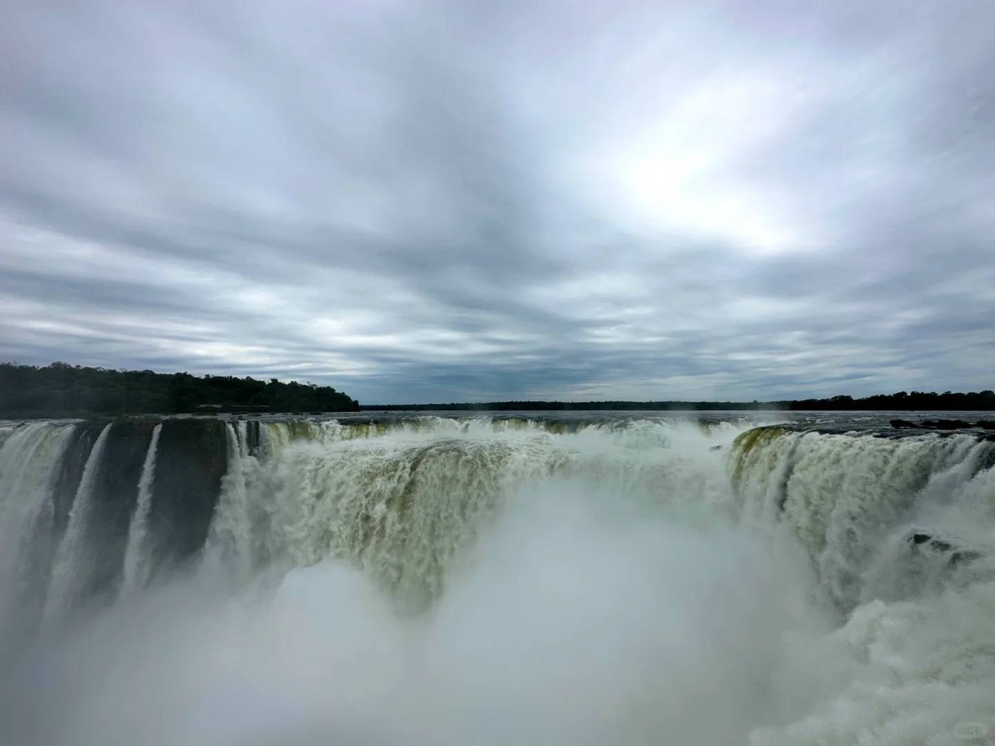 Experience the Natural Cold Shower under Iguazu Falls in South America