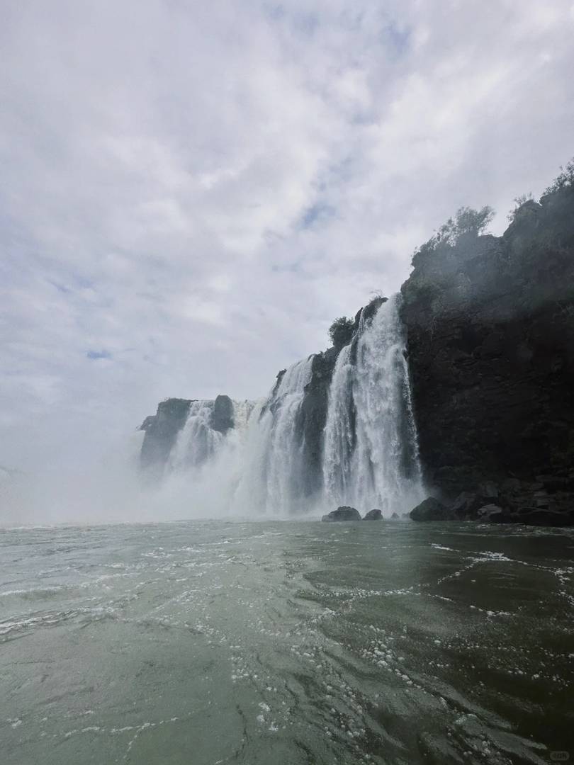 Experience the Natural Cold Shower under Iguazu Falls in South America
